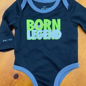 Nike Black Onesie with Blue Trim and Green Text